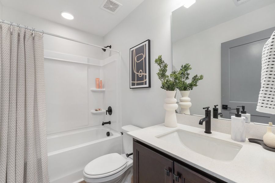 Representative furnished interior of a home built from the Harrington by Baker Residential in Parc at Bradley Farm, Apex (Image 12).