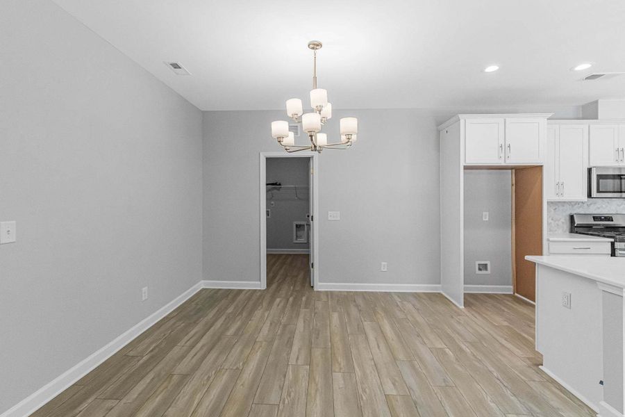 Representative unfurnished interior of a home built from the Weymouth by Caviness & Cates Communities in Bartlett Manor, Youngsville (Image 113).
