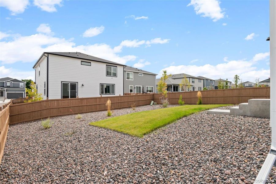 Large landscaped backyard, fully fenced