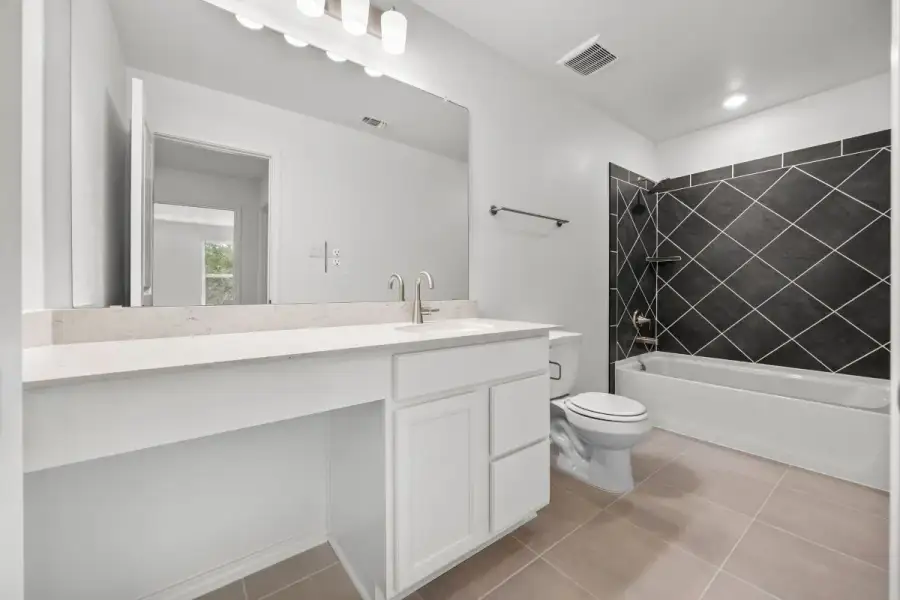 Furnished interior view inside a new home in River Bluff, Leander (Image 11).