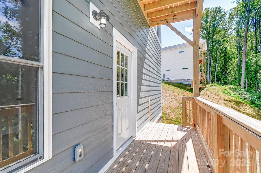 Front exterior of a new home in , Asheville, NC, highlighting curb appeal (Image 2). Front exterior of a new home in , Asheville, NC, highlighting curb appeal (Image 2).