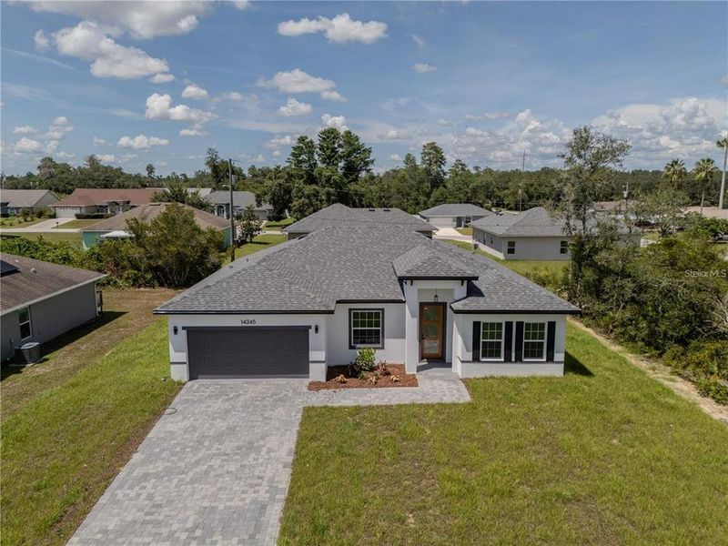 Front exterior of a new home in , Ocala, FL, highlighting curb appeal (Image 30). Front exterior of a new home in , Ocala, FL, highlighting curb appeal (Image 30).