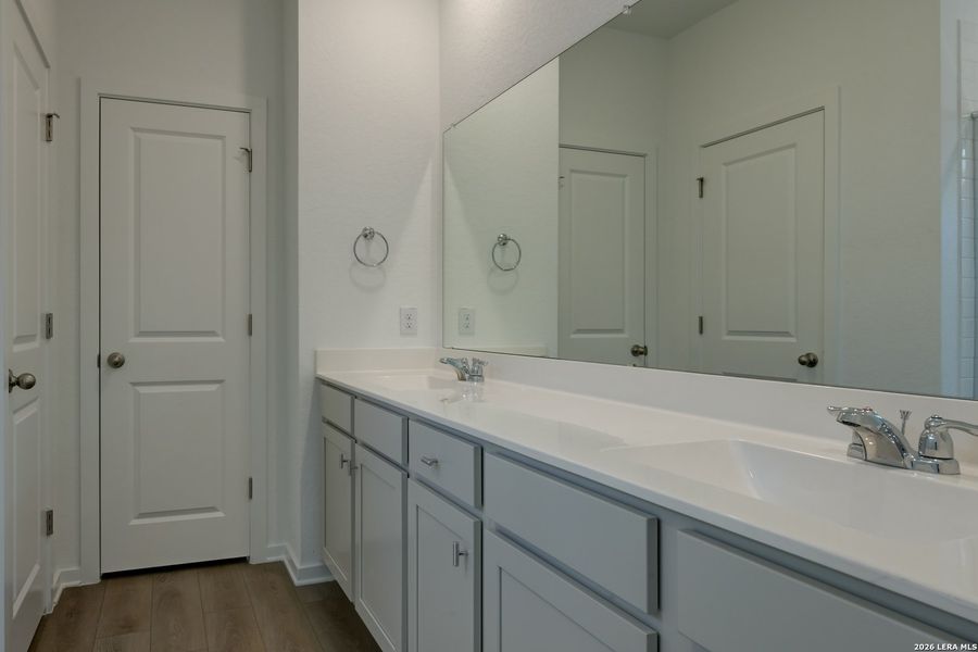 Furnished interior view inside a new home in Hennersby Hollow, San Antonio (Image 9).