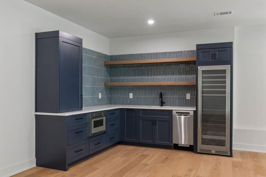Furnished interior view inside a new home in Aster, Roswell (Image 17).
