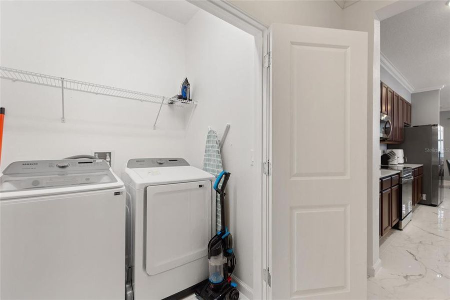 Furnished interior view inside a new home in , Kissimmee (Image 35).