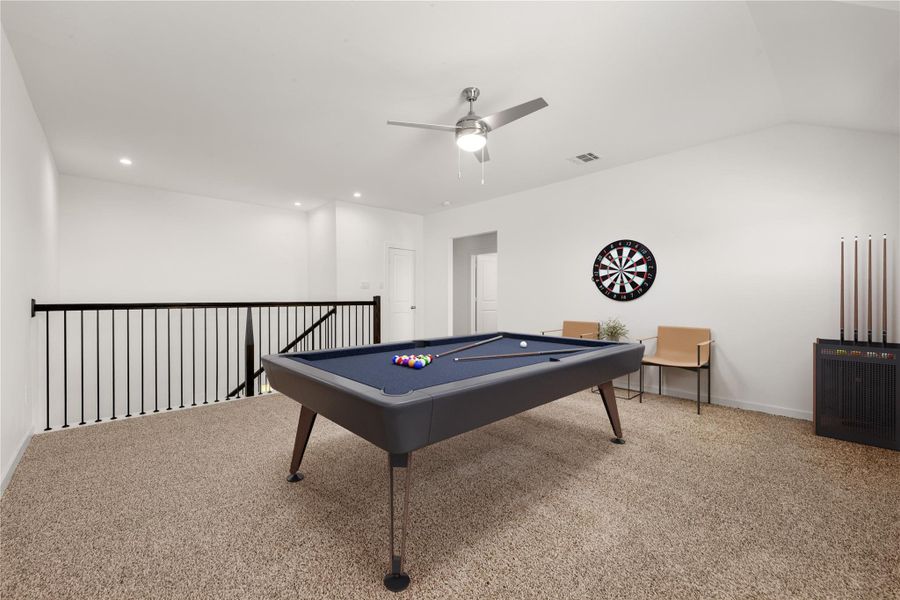 Step into the ultimate entertainment zone! This bright, versatile upstairs Room is the perfect dedicated game room or secondary living area. Featuring ample space for a pool table, it's ready for endless fun and relaxation. The open design and comfortable carpeting create an inviting atmosphere that the whole family will love. *Virtually Staged