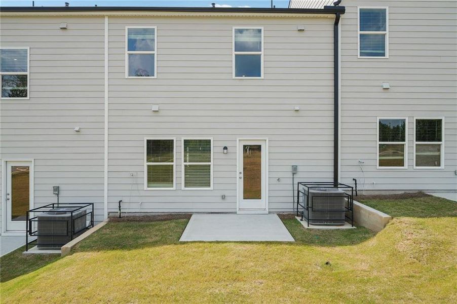 Exterior details and patio area of a home in Artisan Walk, Fairburn (Image 23).