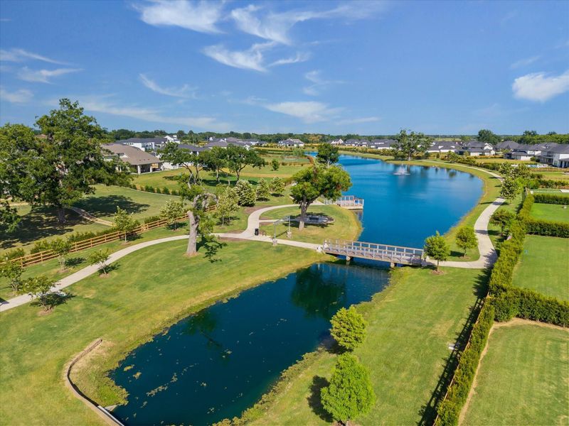 Expansive lakes weave through the community, connected by scenic walking trails, bridges, and shaded green spaces. Thoughtfully designed outdoor areas create a resort style setting for everyday living and weekend relaxation. Expansive lakes weave through the community, connected by scenic walking trails, bridges, and shaded green spaces. Thoughtfully designed outdoor areas create a resort style setting for everyday living and weekend relaxation.