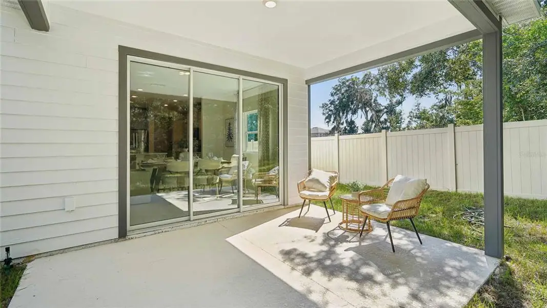 Exterior details and patio area of a home in Buchanan Trails, Newberry (Image 2).