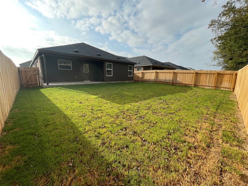 Exterior details and patio area of a home in Waterstone: Claremont Collection, Kyle (Image 3).