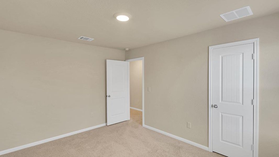 Spacious, unfurnished interior of a new home in Bar W Ranch, Leander (Image 24).