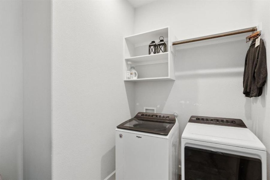 Washroom featuring separate washer and dryer