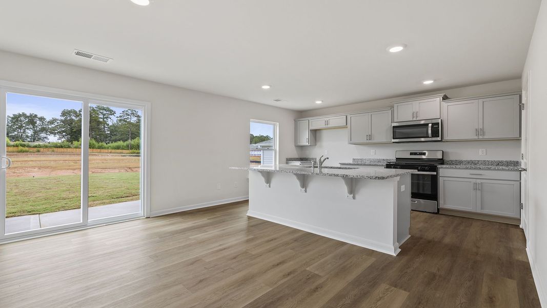Furnished interior view inside a new home in Bentley Park, Greenwood (Image 7).