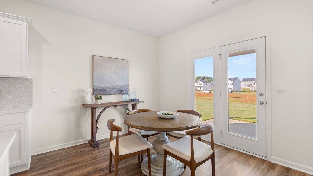 Representative furnished interior of a home built from the HAYDEN Express by D.R. Horton in WillowBrook, Winder (Image 10).