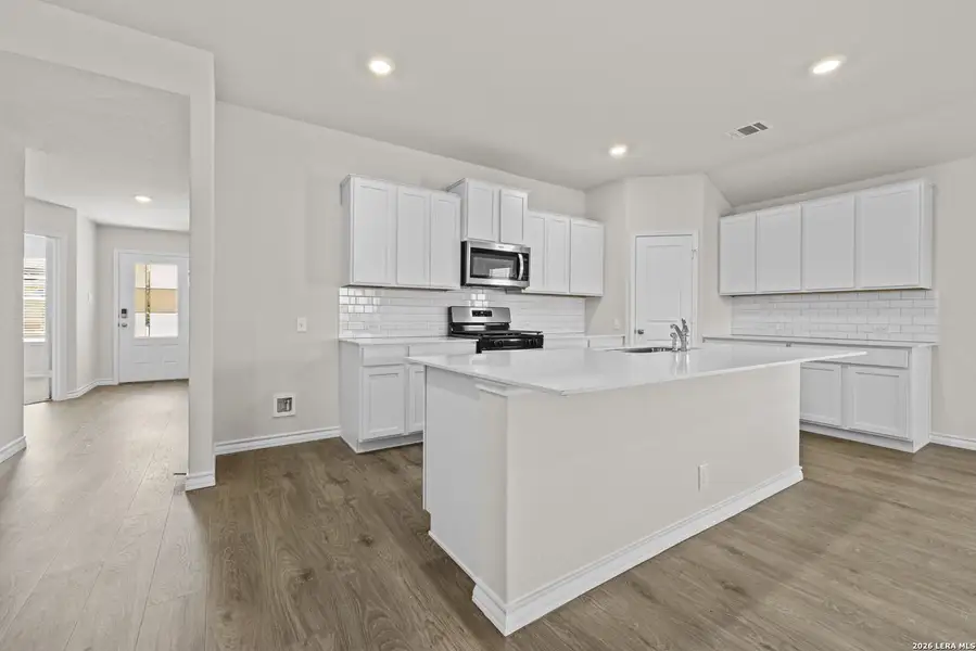 Furnished interior view inside a new home in Redbird Ranch, San Antonio (Image 6).