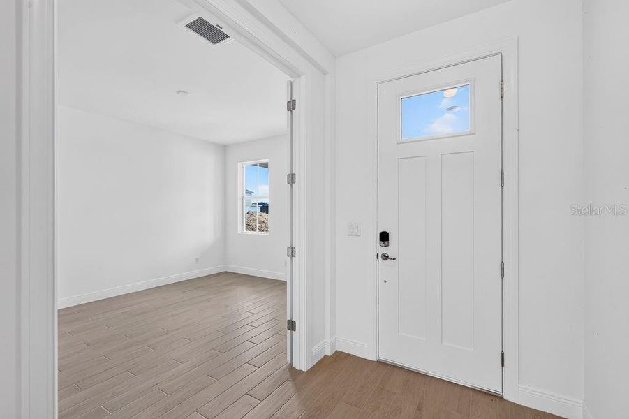 Spacious, unfurnished interior of a new home in The Sanctuary – Royal Collection, Punta Gorda (Image 16). Spacious, unfurnished interior of a new home in The Sanctuary – Royal Collection, Punta Gorda (Image 16).