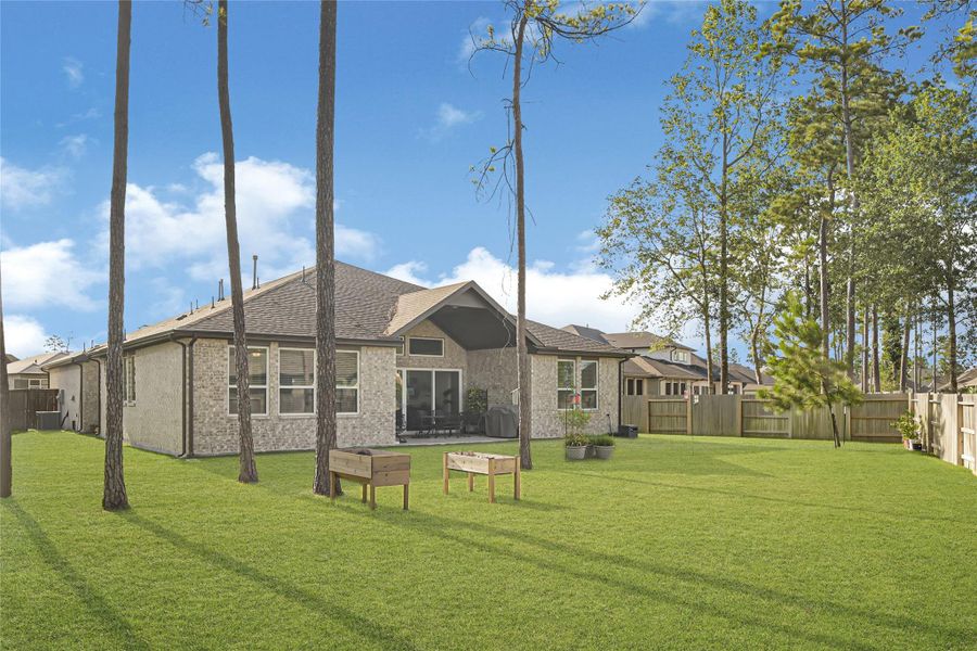 Exterior details and patio area of a home in Evergreen 40s, Conroe (Image 25). Exterior details and patio area of a home in Evergreen 40s, Conroe (Image 25).