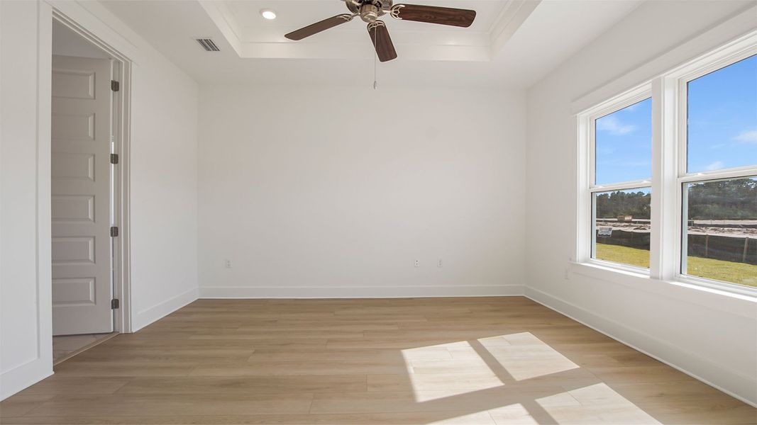 Representative unfurnished interior of a home built from the Magnolia by D.R. Horton in Breakfast Point East Phase II, Panama City Beach (Image 24).