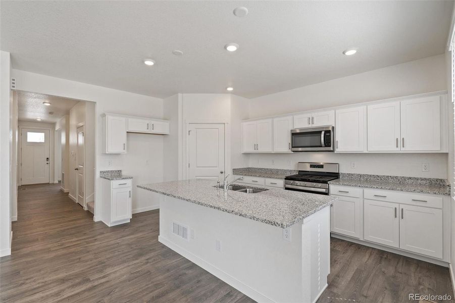 Furnished interior view inside a new home in Trails at Crowfoot, Parker (Image 11).