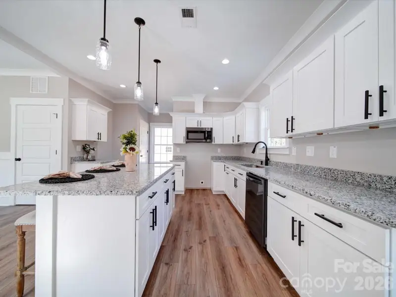 Furnished interior view inside a new home in , Charlotte (Image 5).