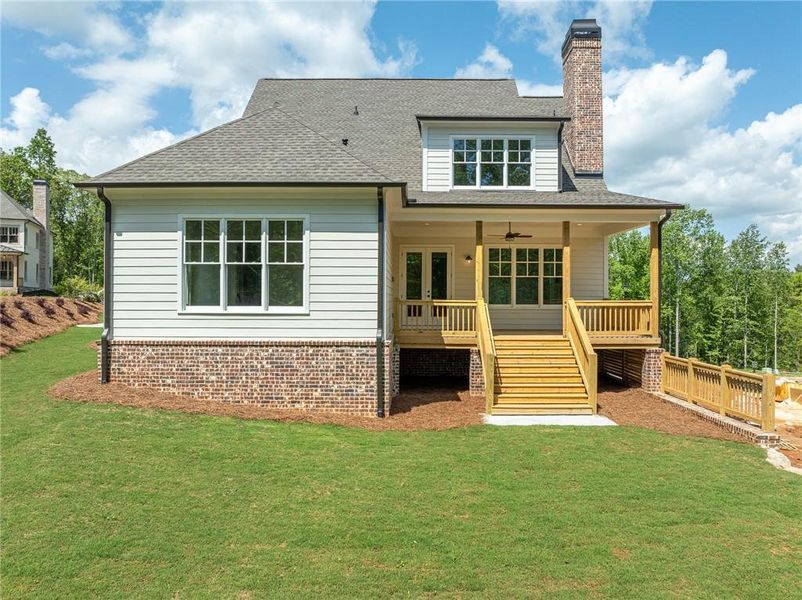 Exterior details and patio area of a home in Malone's Pond, Ball Ground (Image 12).
