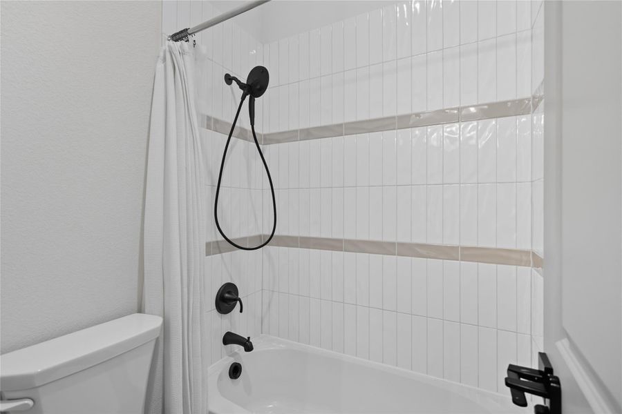 Separate toilet and shower area in secondary bathroom 3. Separate toilet and shower area in secondary bathroom 3.