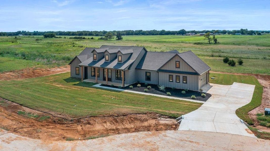 Front exterior of a new home in , Whitesboro, TX, highlighting curb appeal (Image 23). Front exterior of a new home in , Whitesboro, TX, highlighting curb appeal (Image 23).