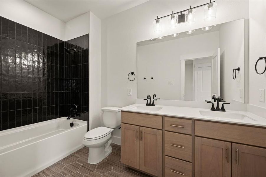 Friends and family will enjoy their own space in this thoughtfully designed guest bath.