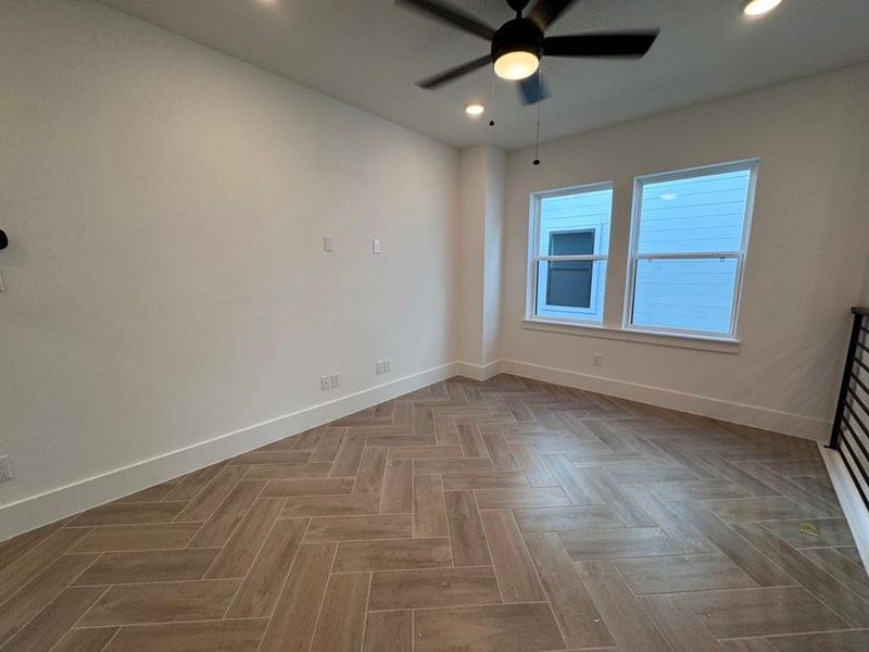 Spacious, unfurnished interior of a new home in Easthaven at Bridgeland Central - Vision Collection, Cypress (Image 12).