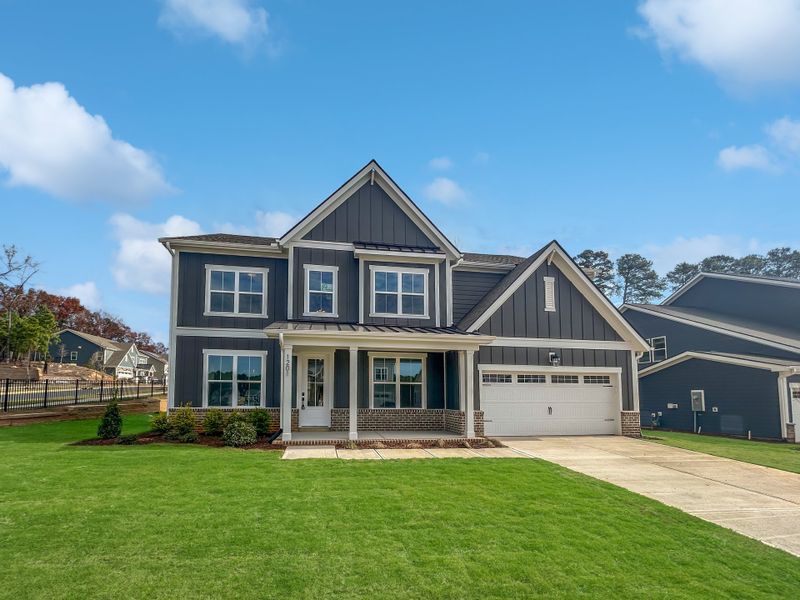 Front exterior of a new home in Stonewood Estates: Landmark, Durham, NC, highlighting curb appeal (Image 1).