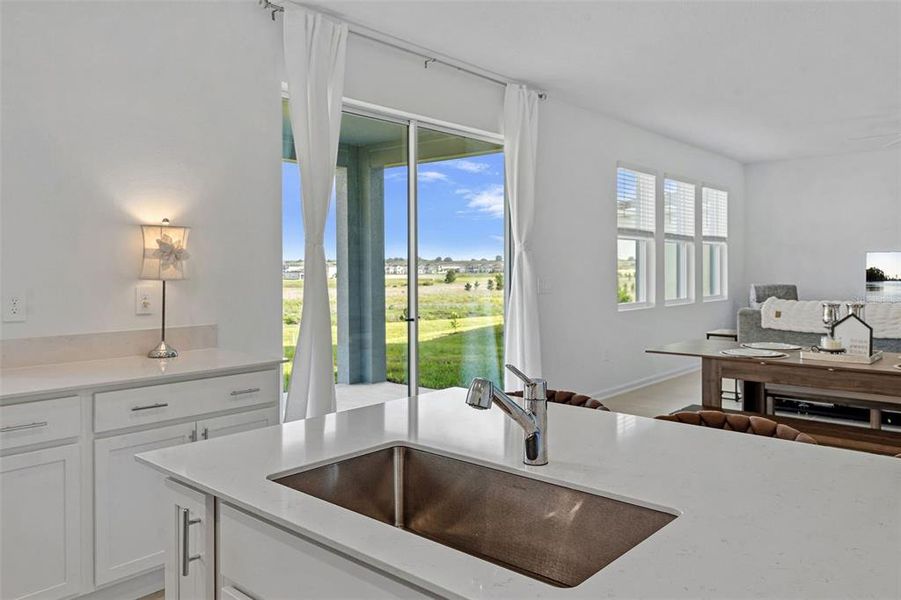 Furnished interior view inside a new home in Wellness Ridge, Clermont (Image 42).