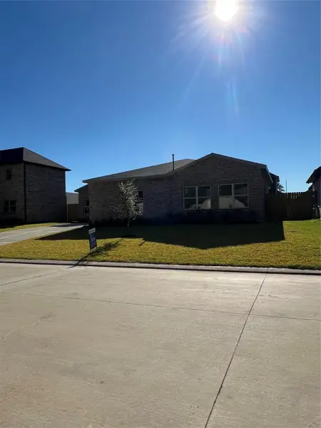 Exterior details and patio area of a home in , Spring (Image 1). Exterior details and patio area of a home in , Spring (Image 1).