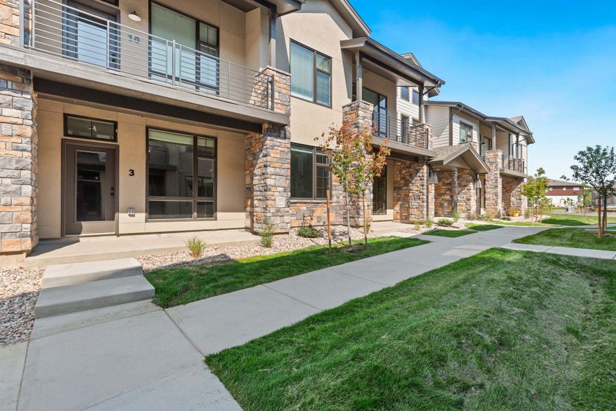 Representative exterior photo of a completed home built from the Oxford by Landmark Homes in Northfield - The Flats, Fort Collins, CO (Image 16).