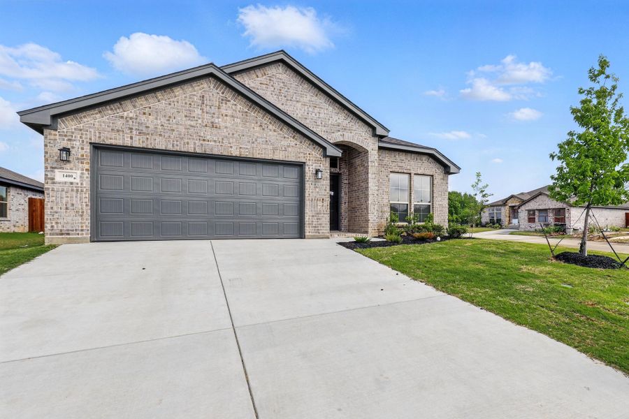 Representative exterior photo of a completed home built from the Devin by Cheldan Homes in Sunset Ridge, Keene, TX (Image 31). Representative exterior photo of a completed home built from the Devin by Cheldan Homes in Sunset Ridge, Keene, TX (Image 31).