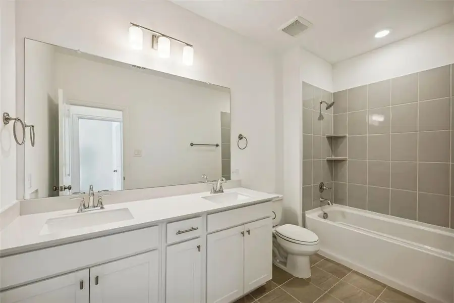 Guests will enjoy their own space in this peaceful and relaxing guest bath.
