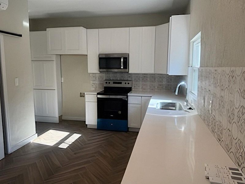 Furnished interior view inside a new home in , Hitchcock (Image 5).