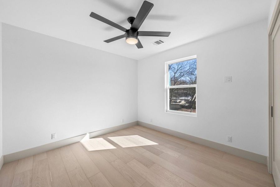 2/3 bedrooms, upstairs. All bedrooms have a ceiling fan.