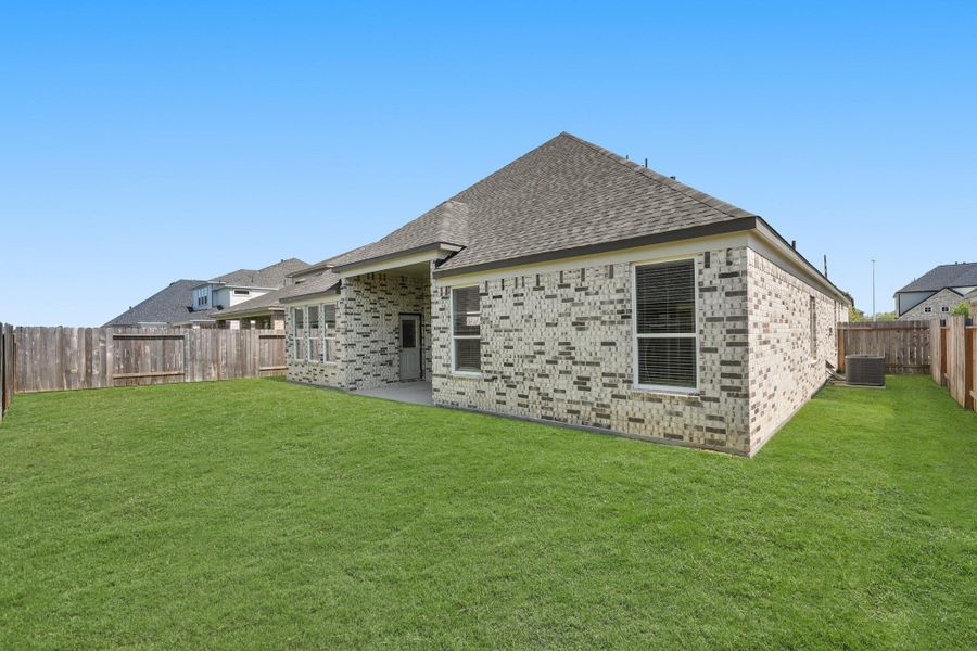 Front exterior of a new home in Briarwood Crossing, Rosenberg, TX, highlighting curb appeal (Image 21). Front exterior of a new home in Briarwood Crossing, Rosenberg, TX, highlighting curb appeal (Image 21).