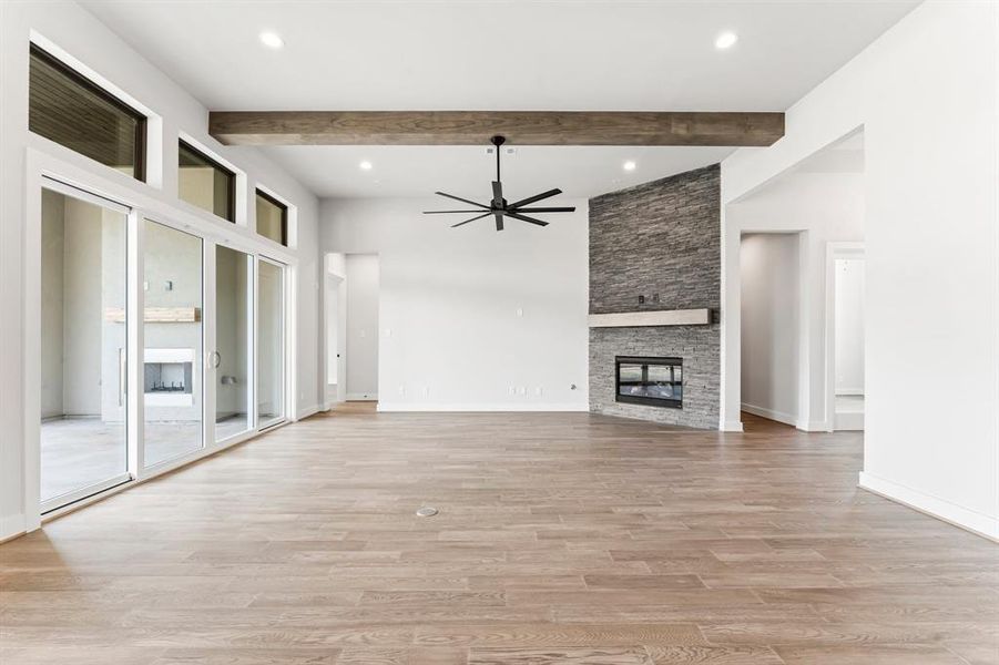 Family Room with Gas Fireplace and Floor Outlet