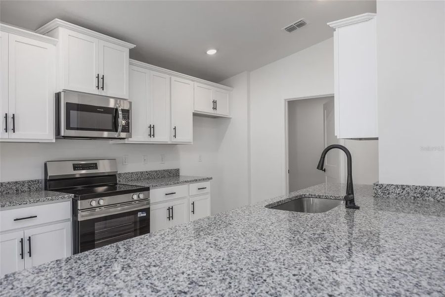 Furnished interior view inside a new home in Country Way South, Newberry (Image 7).