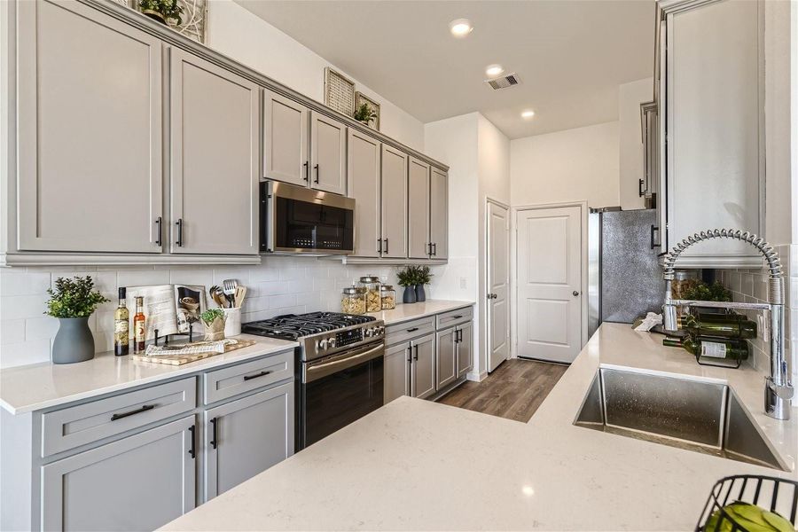 Furnished interior view inside a new home in Bridgeland, Cypress (Image 8).