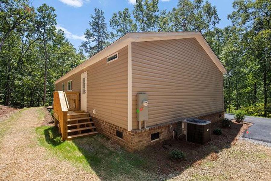 Exterior details and patio area of a home in , Clarkesville (Image 22).
