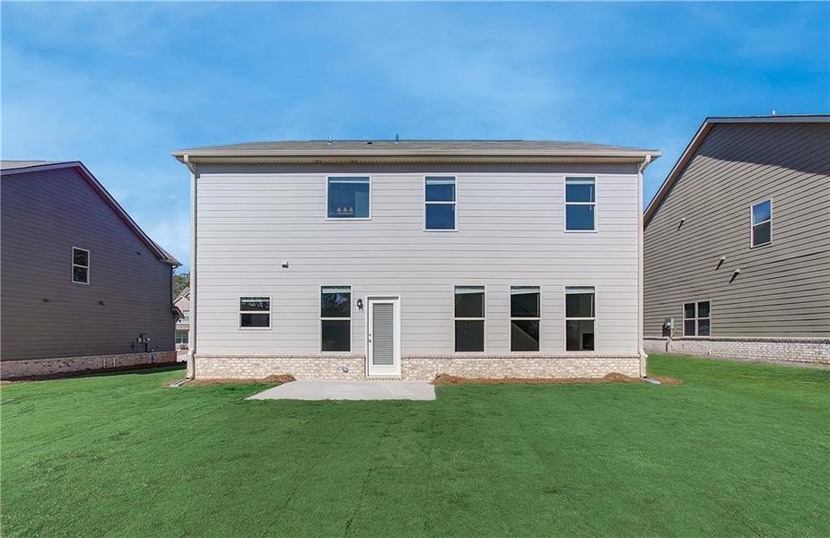 Front exterior of a new home in Cedar Grove Commons, Conley, GA, highlighting curb appeal (Image 1). Front exterior of a new home in Cedar Grove Commons, Conley, GA, highlighting curb appeal (Image 1).