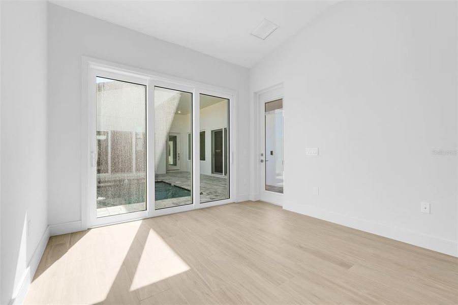 Spacious, unfurnished interior of a new home in Hampton Green at Providence, Davenport (Image 34).