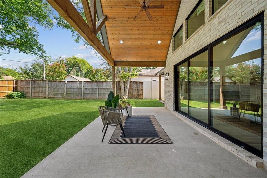 View of patio with ceiling fan