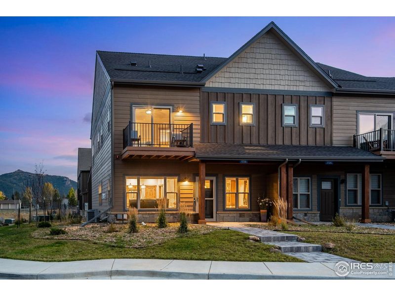 Front exterior of a new home in , Estes Park, CO, highlighting curb appeal (Image 22).