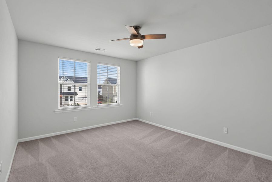 Spacious, unfurnished interior of a new home in Sweetgrass at Summers Corner, Summerville (Image 54).