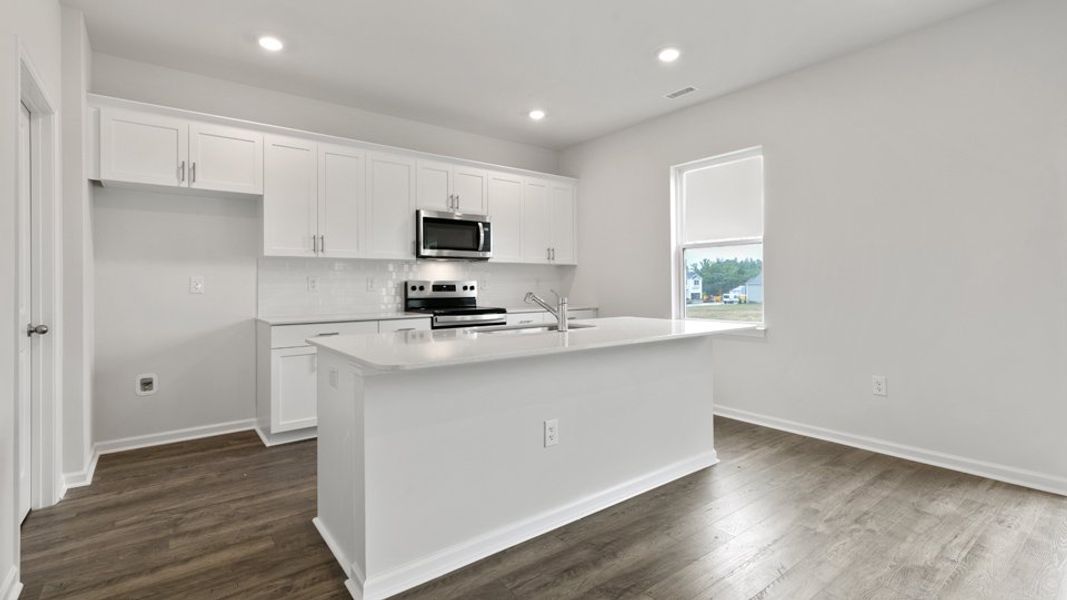 Furnished interior view inside a new home in Villa Grande, Winterville (Image 8).