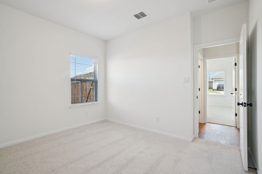Spacious, unfurnished interior of a new home in Village at Three Oaks, Seguin (Image 46).