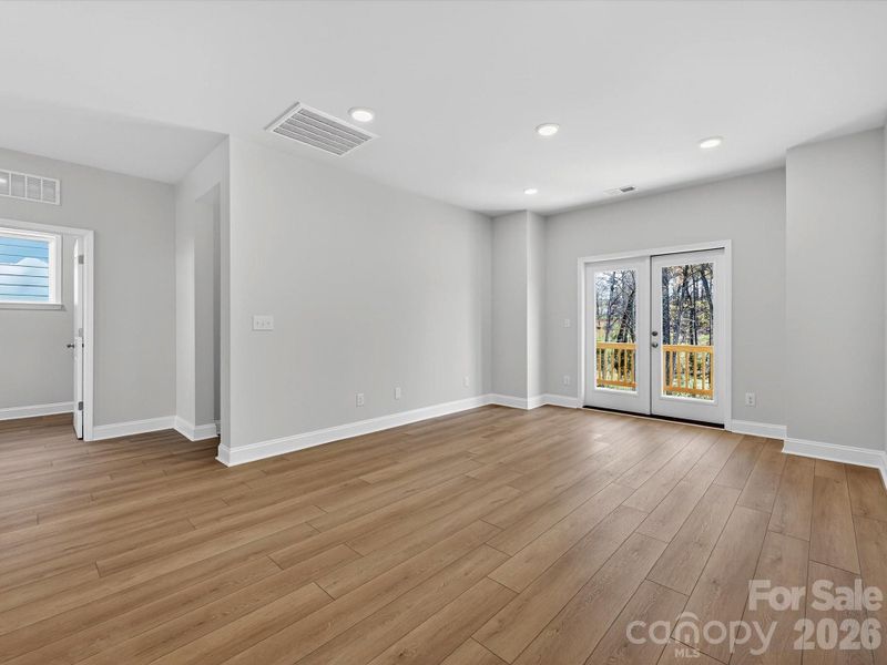 Spacious, unfurnished interior of a new home in North Creek Village, Huntersville (Image 20).